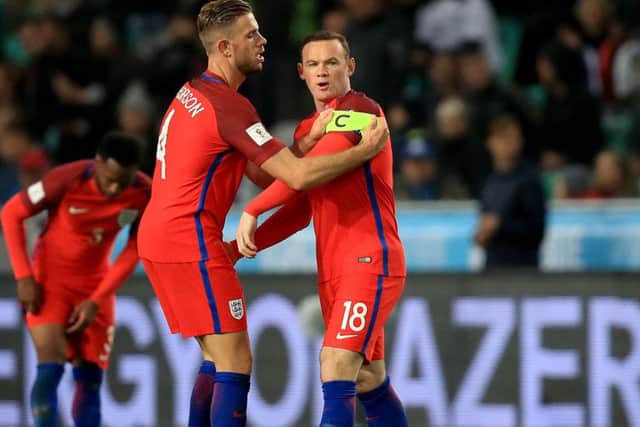OVER TO YOU: Stand-in Jordan Henderson insists Wayne Rooney remains the first-choice captain for England. Picture: Mike Egerton/PA.