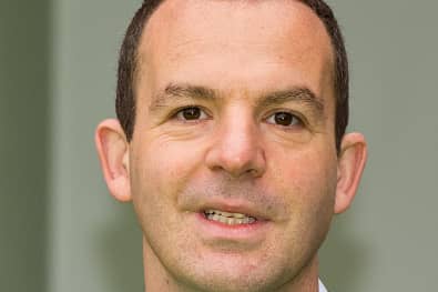 Martin Lewis has issued an urgent warning to mobile phone consumers to switch providers, which could save them hundreds of pounds every year. (Getty Images)
