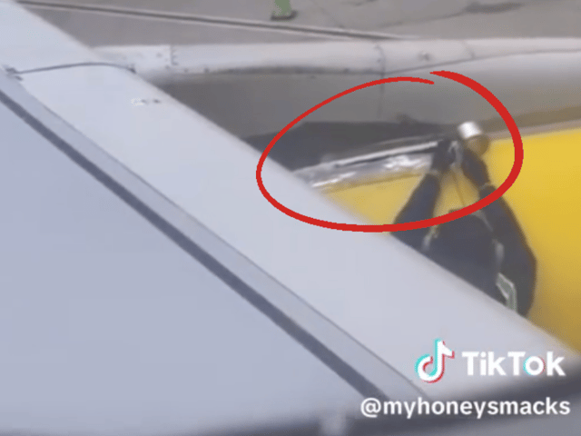Concerned Spirit Airlines passenger captures moment worker tapes plane wing before take-off 