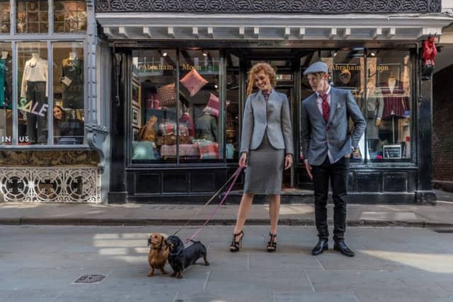 With guest canine models Heidi and Ruby - Jess wears: Pink Arthur Shirtley shirt, £120; grey Abraham Moon skirt, £109, and blazer, £270, all stocked at Abraham Moon. Jet and pearl bracelet, £182.95, and necklet, £498, both W Hamond; black zip heels, £99, Carvela Kurt Keiger. Josh wears: White Holland Esquire shirt, £90; grey Holland Esquire blazer, £375; red fox tie, £15; grey flat cap, £38, all stocked at Abraham Moon. Jeans, model's own; shoes, by Kurt Geiger. Picture James Hardisty. Styling and shoot production: Stephanie Smith. Hair: Emma Tierney at Ross Charles. Make-up: Ash Fehners.