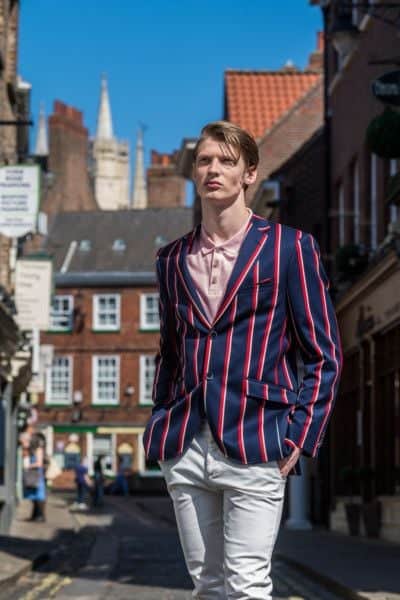 Josh wears: Striped blazer, £299; pink Colours & Sons at Abraham Moon polo, £45, both stocked at Abraham Moon. Jeans, model's own. Picture James Hardisty. Styling and shoot production: Stephanie Smith