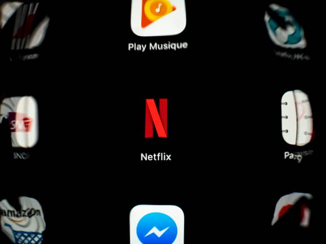 Netflix app. Photo: LIONEL BONAVENTURE/AFP via Getty Images