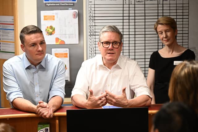Prime Minister Sir Keir Starmer (centre) and Health Secretary Wes Streeting (left), with NHS CEO Amanda Pritchard (right). Credit: Leon Neal/PA Wire