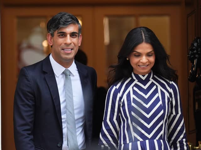 Rishi Sunak and his wife Akshata Murty. Credit: James Manning/PA Wire