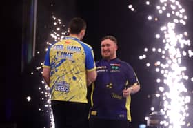 Luke Humphries (L) and Luke Littler (R) after a Premier League Darts match