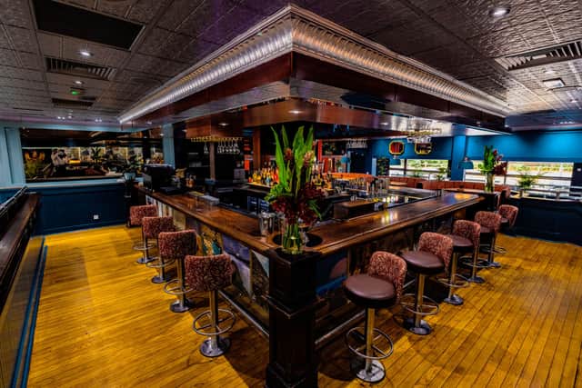 A statement open bar is a stunning focal point of the new restaurant