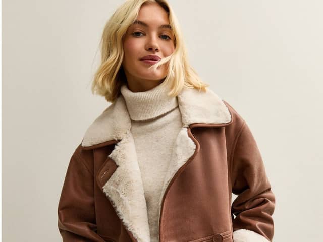 The New Look Brown Contrast Trim Bonded Jacket is the ultimate autumn essential for pumpkin picking 