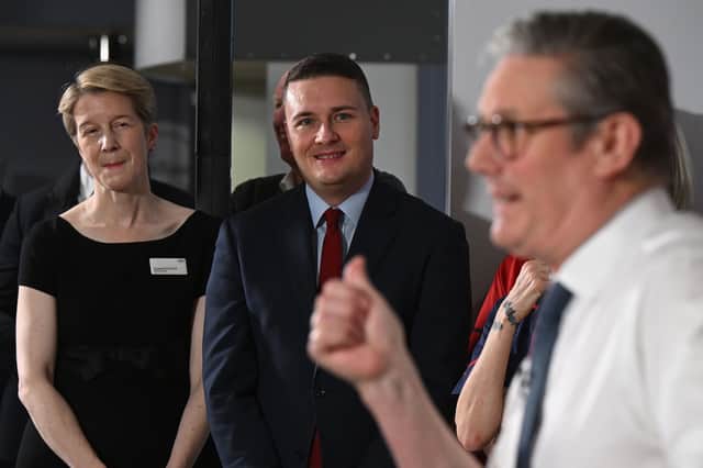 Health Secretary Wes Streeting, standing alongside NHS chief executive Amanda Pritchard, looks on as Prime Minister Sir Keir Starmer delivers a speech in Surrey in January.
