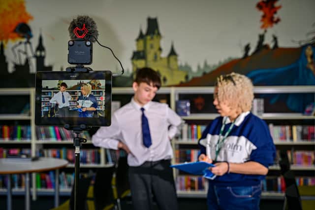 Artist Tanya Vital with student in Digital Creatives workshop