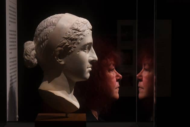 BAFTA-award-winning Egyptologist Professor Joann Fletcher. pictured with a Marble Bust of Cleopatra