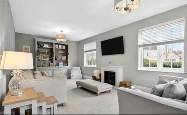 The living room of a four-bedroom detached house that is for sale on Bletchley Road, Leeds.