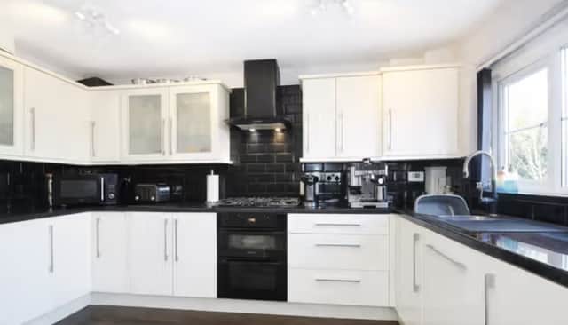 The kitchen of a four-bedroom town house that is for sale in Willowdale, Leeds.