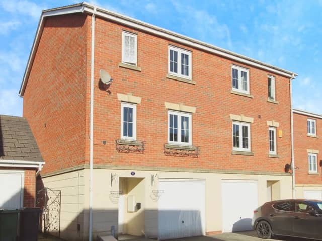 A four-bedroom town house that is for sale in Willowdale, Leeds.