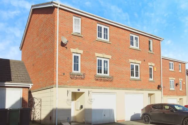 A four-bedroom town house that is for sale in Willowdale, Leeds.