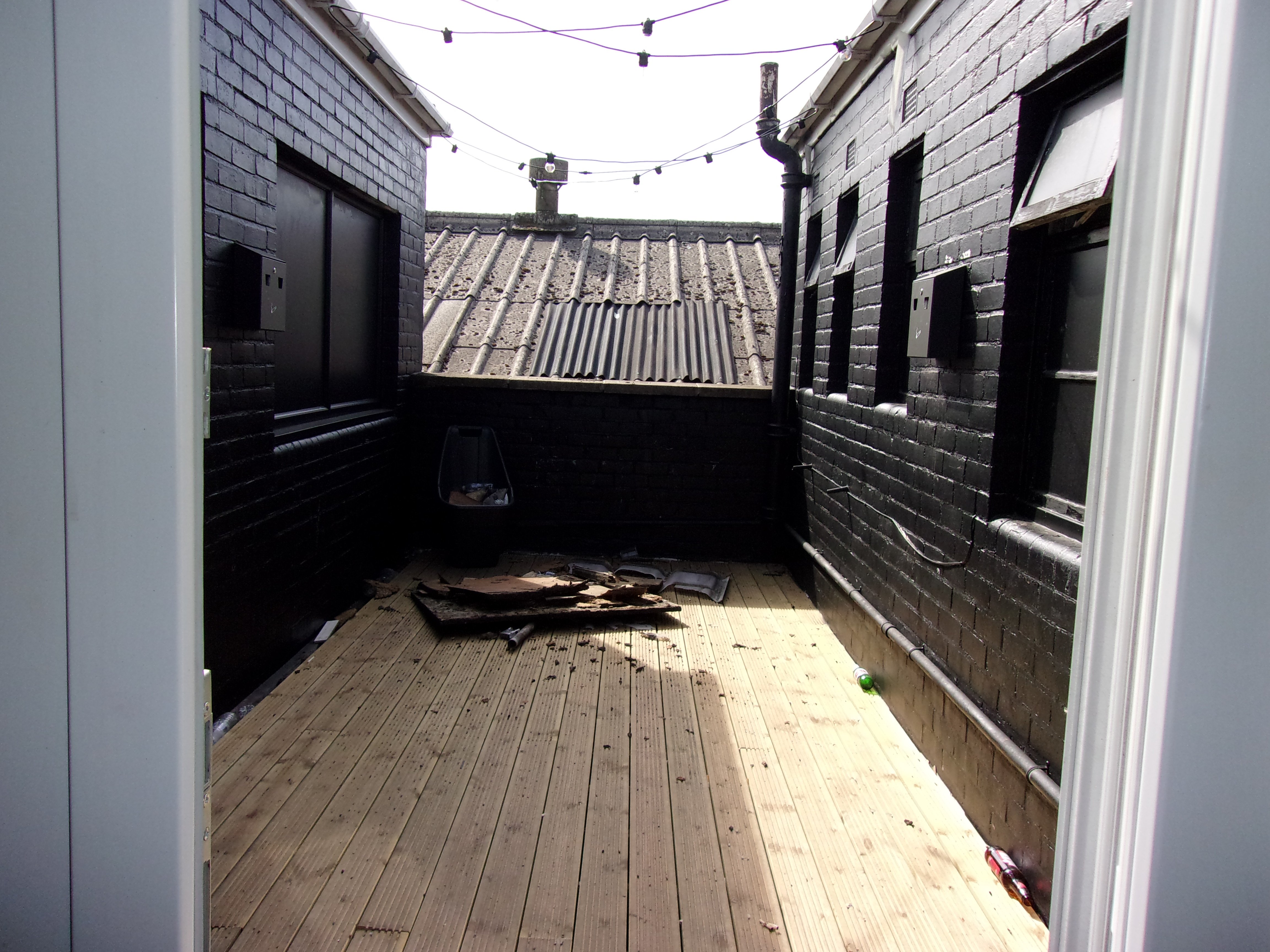 Two men jailed after death of woman who fell through roof at illegal event