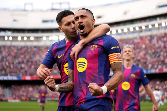 Roony Bardghji plays with former Leeds United star Raphinha at Barcelona.