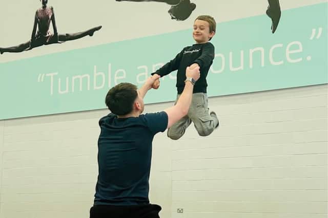 Zak Bailey enjoys a trampoline session with a Qualitas coach as part of the organisation's SEND support programme