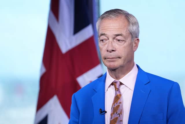 Reform UK leader Nigel Farage makes a statement to the media at the party headquarters in Millbank, London (Gareth Fuller/PA)