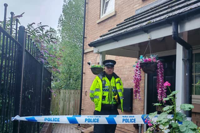 Police continue to guard a house in Wincobank, Sheffield, following the death of a baby girl