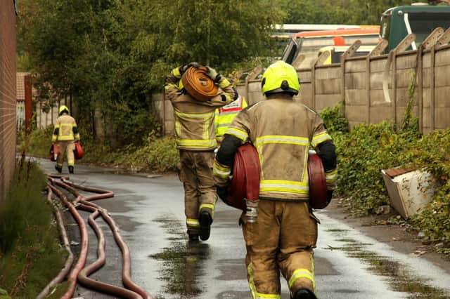 A man has been arrested after a firefighter was attacked