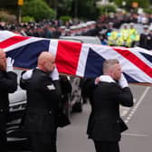 Pall bearers carry the coffin of PC Matthew Blades into his funeral at St Joseph's Roman Catholic Church in Hartlepool