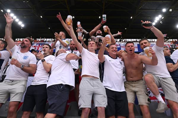 England fans drinking in the stands at Euro 2024 in Germany.