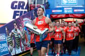 Sir Kevin Sinfield brings out the trophy ahead the Betfred Super League Grand Final at Old Trafford, Manchester.