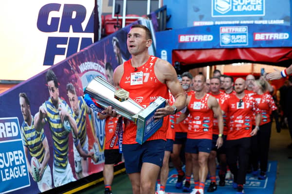 Sir Kevin Sinfield brings out the trophy ahead the Betfred Super League Grand Final at Old Trafford, Manchester.