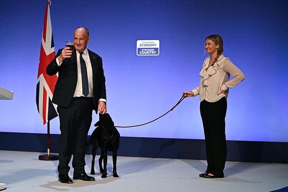 Kevin Hollinrake brings out black Labrador Zuzu along with pint of warm ...