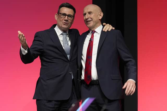 Prime Minister Andy Burnham (left) with Chancellor of the Exchequer John Healey on the main stage during the Labour Party Conference in Liverpool in September 2026