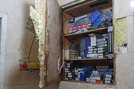 counterfeit products found in secret cupboards