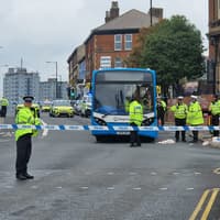 Woman in 'life-threatening' condition after crash involving bus on busy Yorkshire road