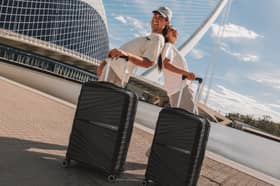 The black ATX Luggage 21-inch cabin suitcase has a 44-litre capacity, four double spinner wheels and a built-in TSA-approved lock.
