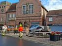 A Range Rover has mounted a paved area and knocked down the Market Cross in Howden,