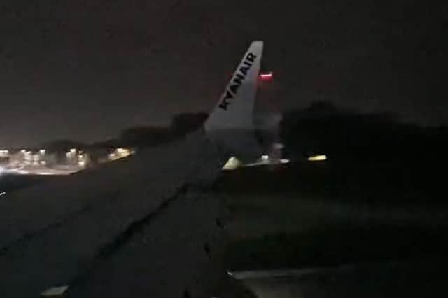 Plane lands in Storm Boelo's strong winds at Leeds Bradford Airport on Saturday 24 October.