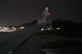 Plane lands in Storm Boelo's strong winds at Leeds Bradford Airport on Saturday 24 October.
