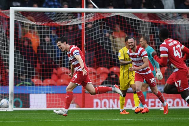 Owen Bailey notched twice as Doncaster Rovers defeated Sheffield Wednesday.