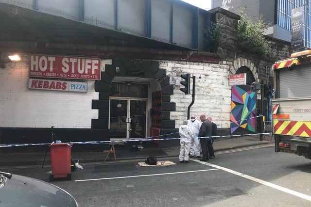 Crime scene after Russell Atkinson was left with serious brain injuries after being struck over the head with a piece of wood on Bishopgate Street in Leeds city centre