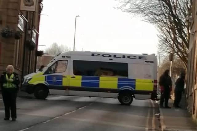Onlookers watched as officers from West Yorkshire Police sealed off Wellington Road and Commercial Street, before entering the former Yorkshire Bank premises on Sunday afternoon