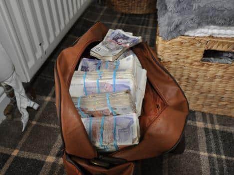 Cash seized from Robert Clark's house. Photos provided by West Yorkshire Police.