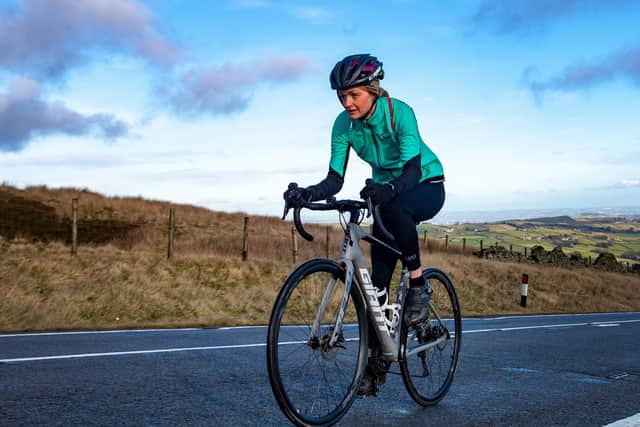 Rachel Cullen cycling up Holme Mos.  Picture Bruce Rollinson