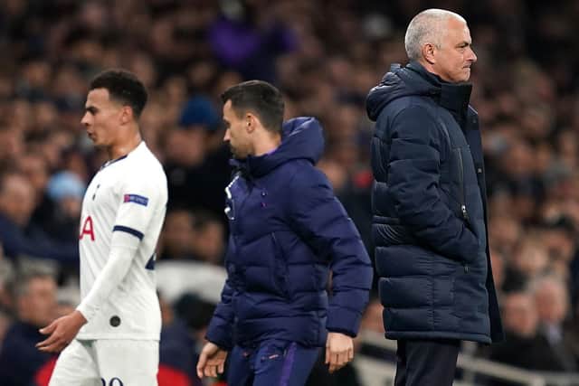 Tottenham Hotspur's Dele Alli reacts badly to being substituted as manager Jose Mourinho (right) looks on. Picture: John Walton/PA
