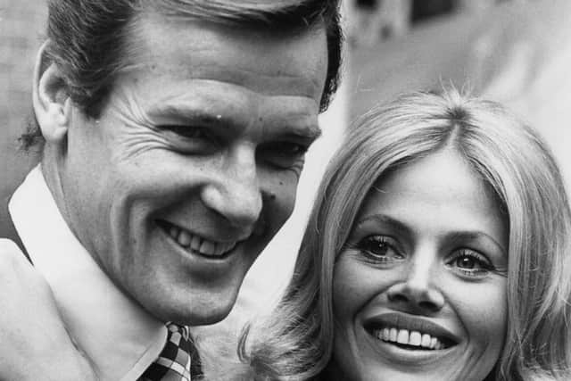 Swedish actress Britt Ekland attends a reception at the Cleremont Hotel in London with Roger Moore. They both star in the new James Bond film 'The Man with the Golden Gun'.    (Photo by Central Press/Getty Images)