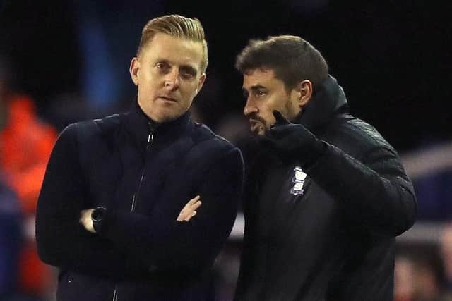 WORLDS APART: Garry Monk, left, and assistant manager Pep Clotet, during their time at Birmingham City. Picture: Simon Cooper/PA