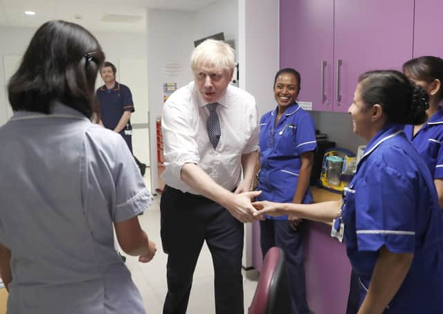 Boris Johnson meets a group of nurses. Photo: Alastair Grant/PA Wire