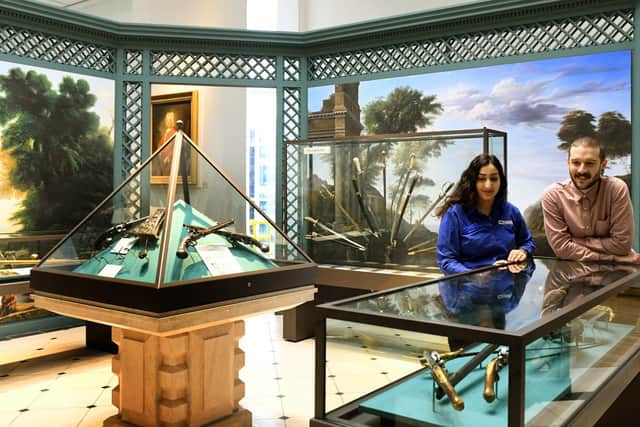 Manpreet Dhadda , museums assistant, and Mark Jackson, head of education and events in the Hunting Gallery at the Royal Armouries in Leeds.