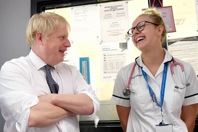 Prime Minister Boris Johnson meets staff and nurses during a visit to King's Mill Hospital in Sutton-in-Ashfield, while on the General Election campaign trail around the country. PA Photo