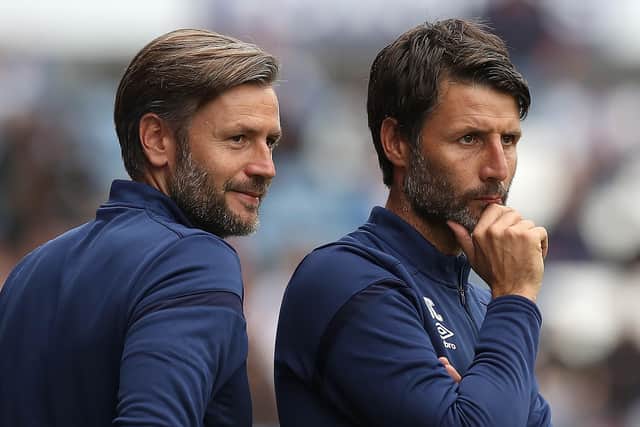 THERE MAY BE TROUBLE AHEAD: Huddersfield Town manager Danny Cowley, right, with brother and assistant manager Nicky. Picture: Martin Rickett/PA
