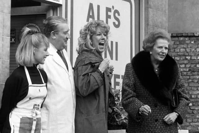Former prime minister Margaret Thatcher's tour of the set of Coronation Street in 1990. She apparently began to keep a note of what she wore in 1988, and diary entries for 1990 record that she wore her "Pink Chanel Gorbachev" to Coronation Street and her "Wogan Burgundy" to the Bank of England. Photo: PA/PA Wire
