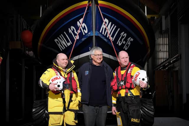 Staff Mark Jenkinson, Lifeboat Operations Manager Andy Volans and Will Watts reflect on the future benefits the cash will bring. pic Richard Ponter